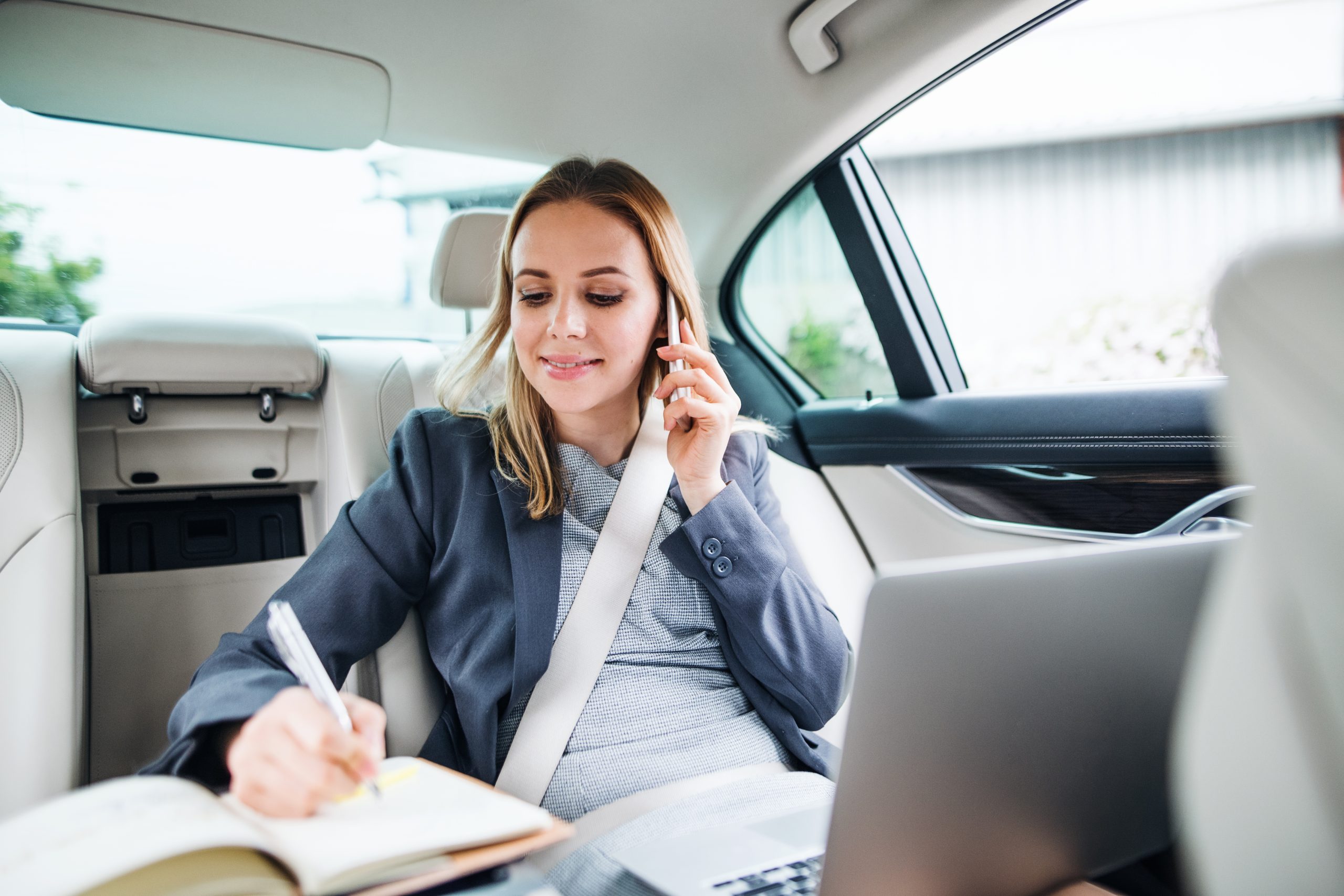 Go Cars Luton Business Woman in Taxi